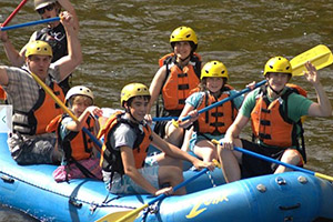 family raft trip in western massachusetts